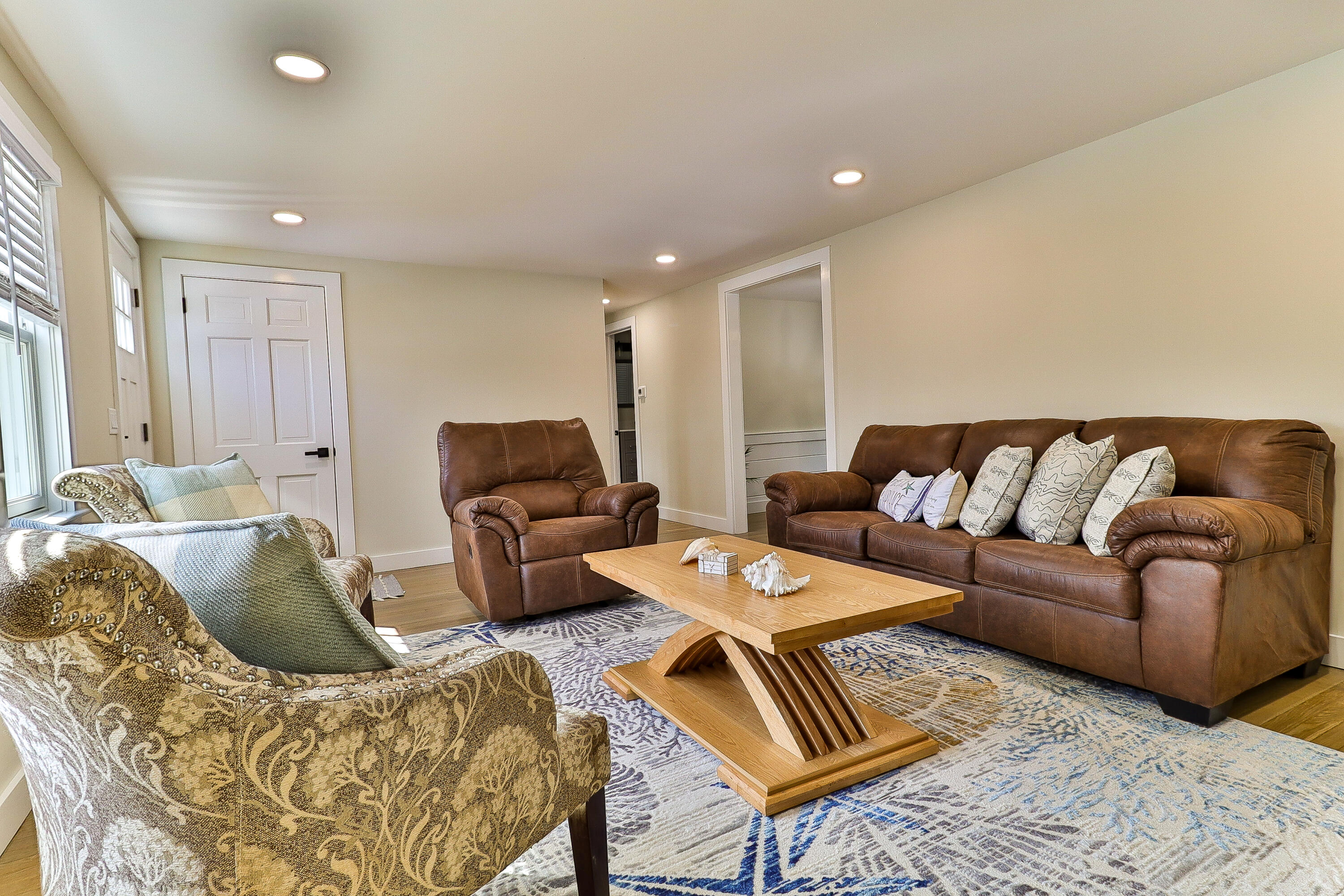 49 Huckins Neck Road Centerville, MA 02632 - Photo 5 of 23 a living room with furniture and wooden floor