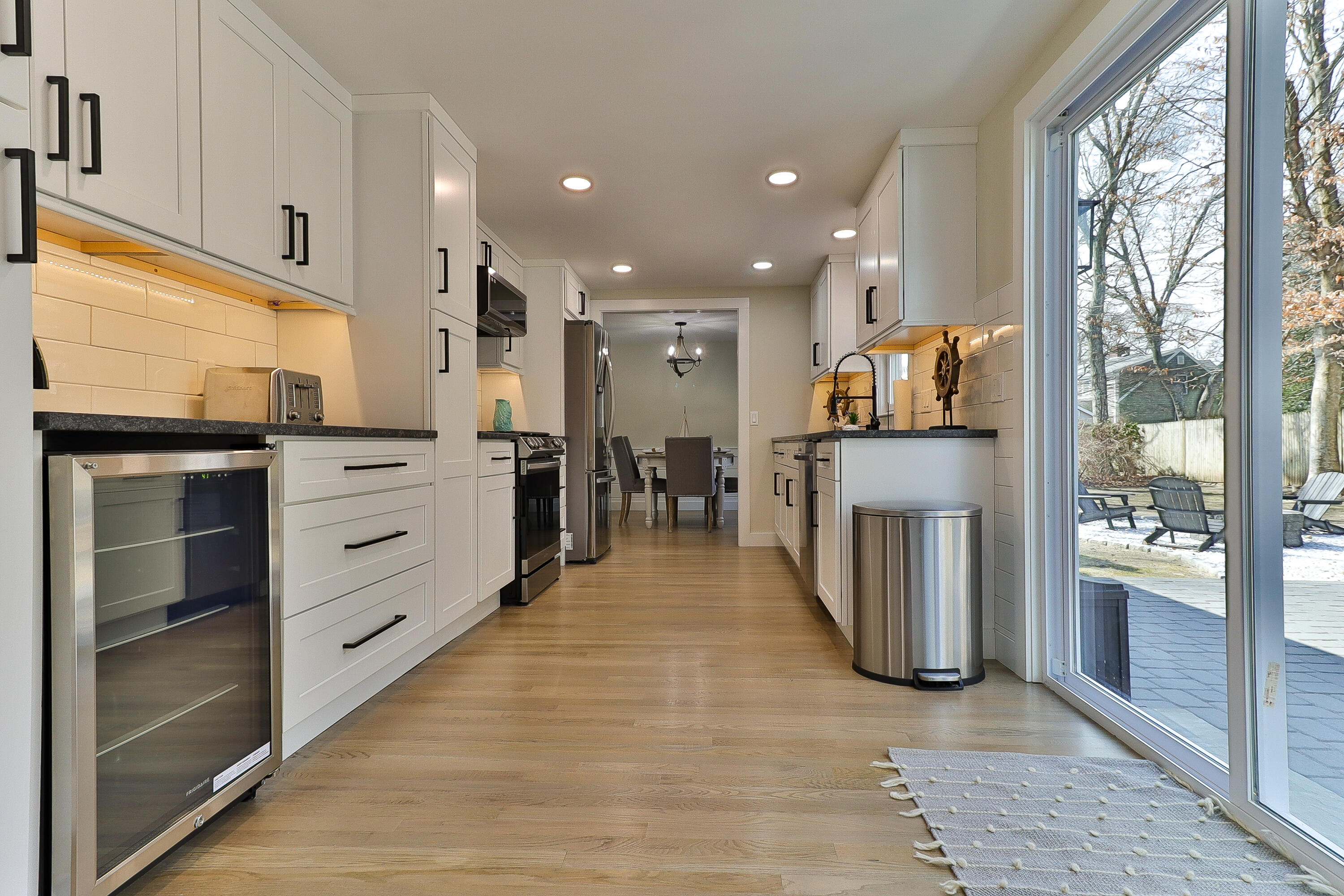 49 Huckins Neck Road Centerville, MA 02632 - Photo 8 of 23 a view of a kitchen with cabinets