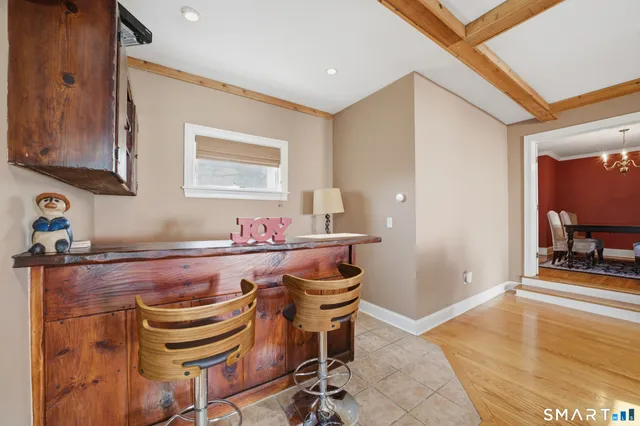 a room with dining table and chairs