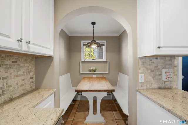 a room with fireplace and window