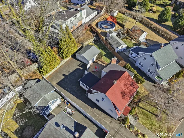 an aerial view of a house with a ocean view
