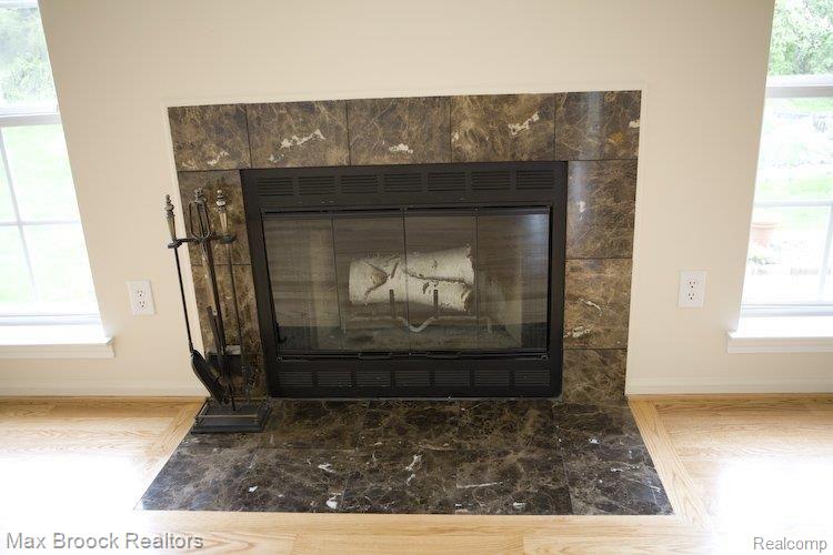 4996 South Ridgeside Circle Ann Arbor, MI 48105 - Photo 10 of 23 granite fireplace