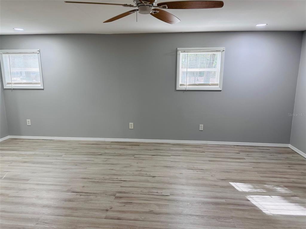 13750 Northwest 88th Terrace Chiefland, FL 32626 - Photo 13 of 33 a view of an empty room with a window