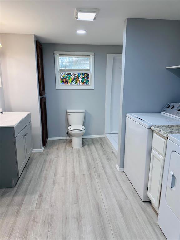 13750 Northwest 88th Terrace Chiefland, FL 32626 - Photo 14 of 33 a view of a bathroom with a sink and a toilet