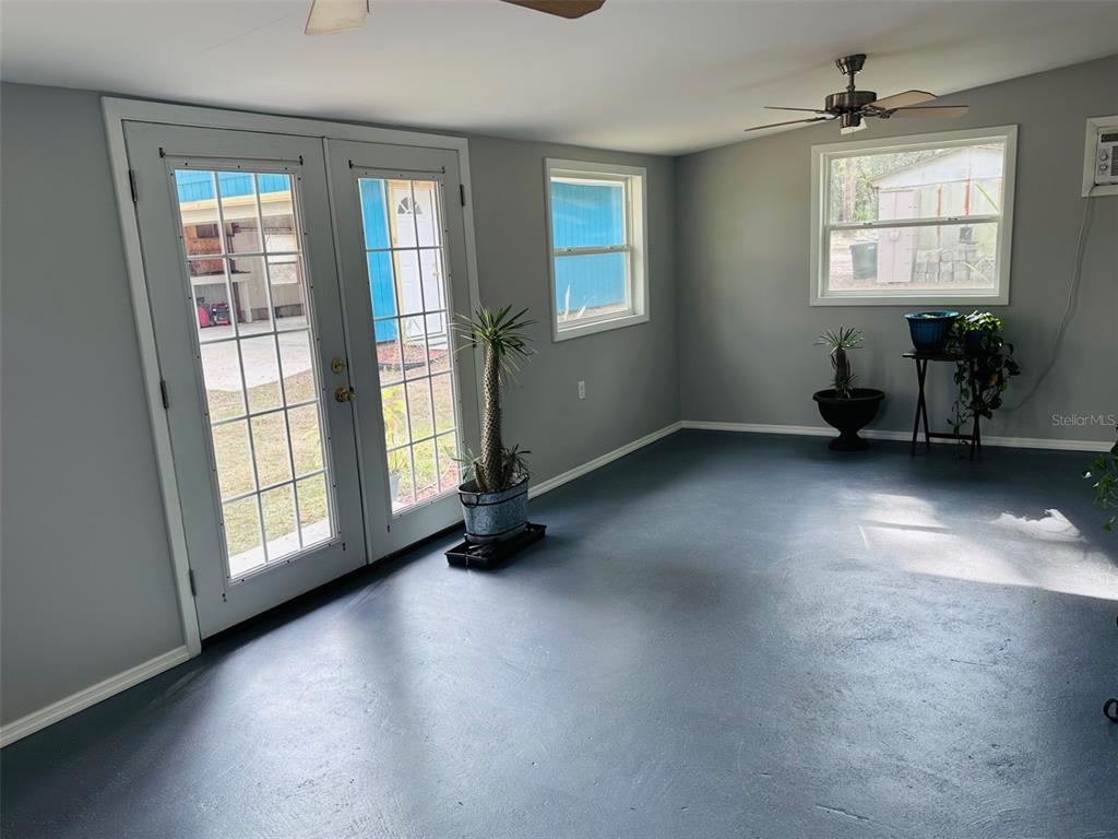 13750 Northwest 88th Terrace Chiefland, FL 32626 - Photo 18 of 33 an empty room with windows