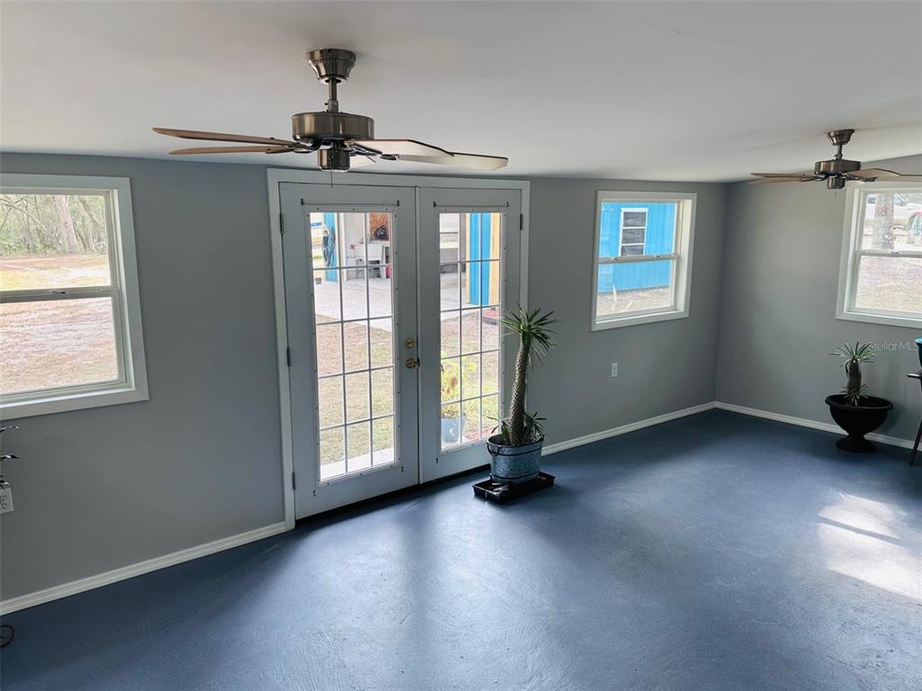 13750 Northwest 88th Terrace Chiefland, FL 32626 - Photo 19 of 33 a view of an empty room with a window