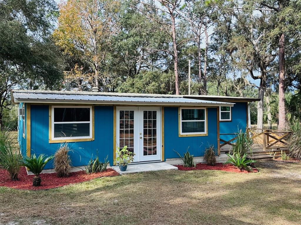 13750 Northwest 88th Terrace Chiefland, FL 32626 - Photo 27 of 33 a view of a house with outdoor space