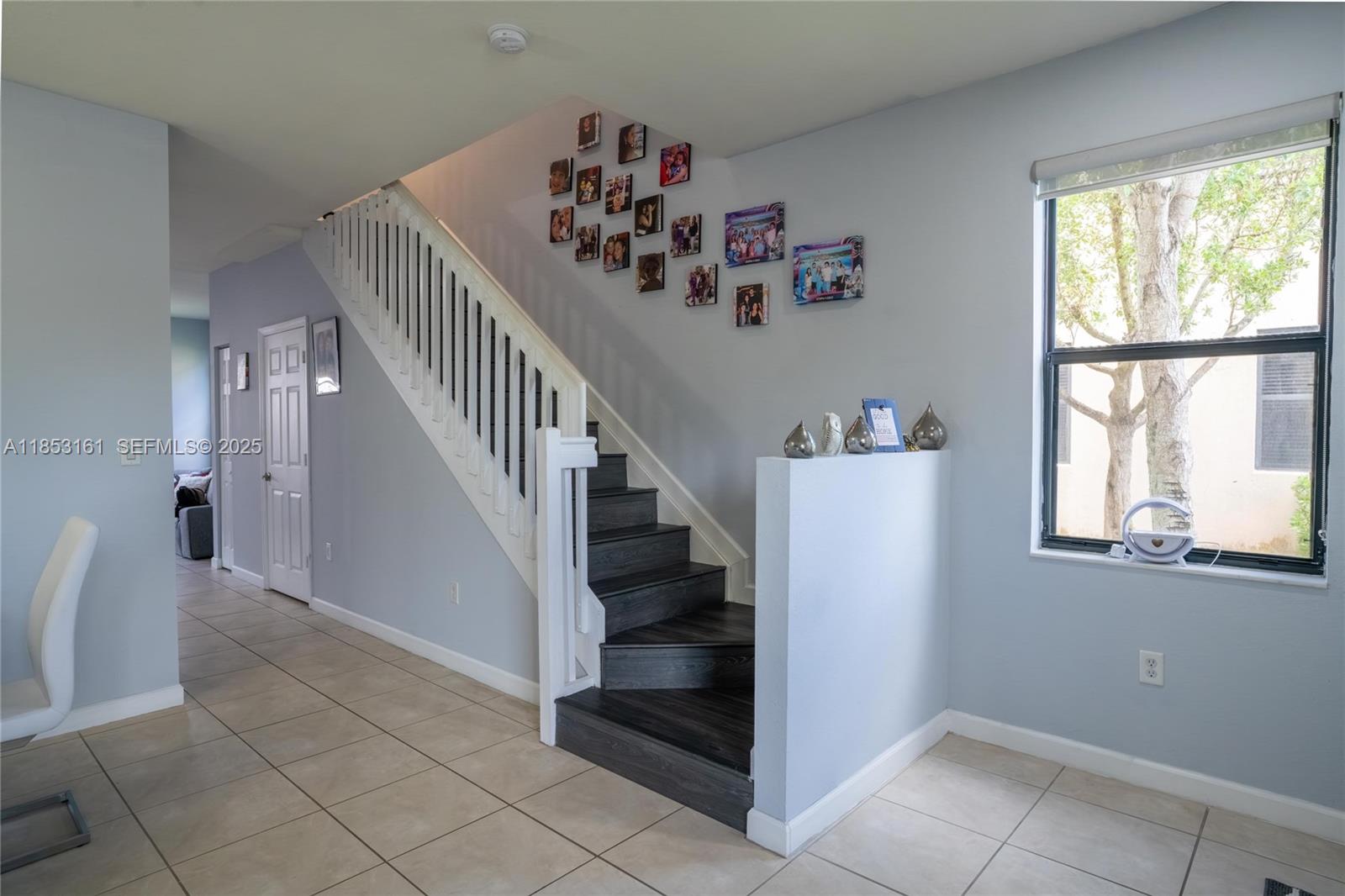 11571 Southwest 248th Lane Homestead, FL 33032 - Photo 13 of 26 a view of entryway and workspace