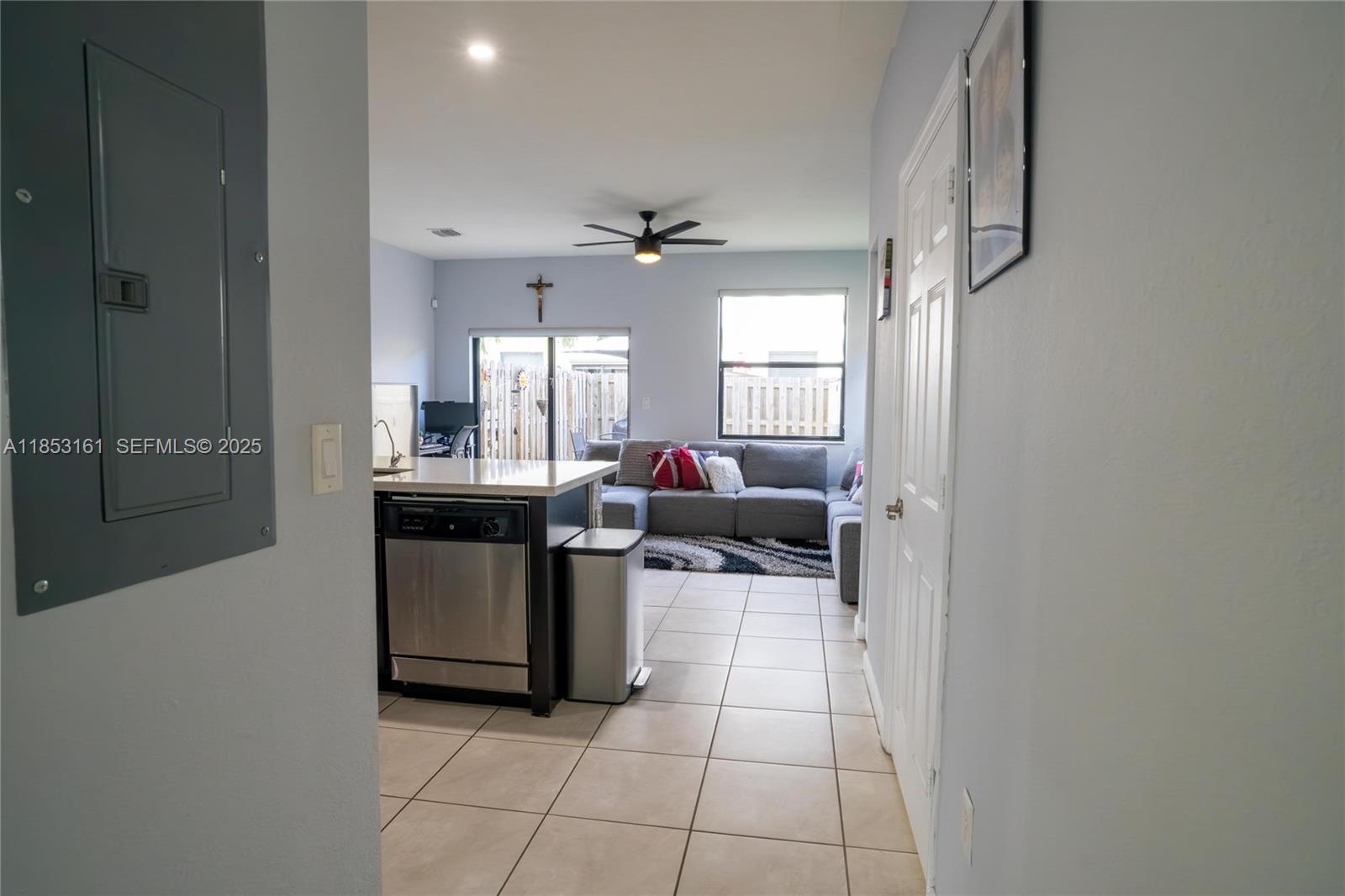 11571 Southwest 248th Lane Homestead, FL 33032 - Photo 14 of 26 a kitchen with stainless steel appliances a sink stove and cabinets