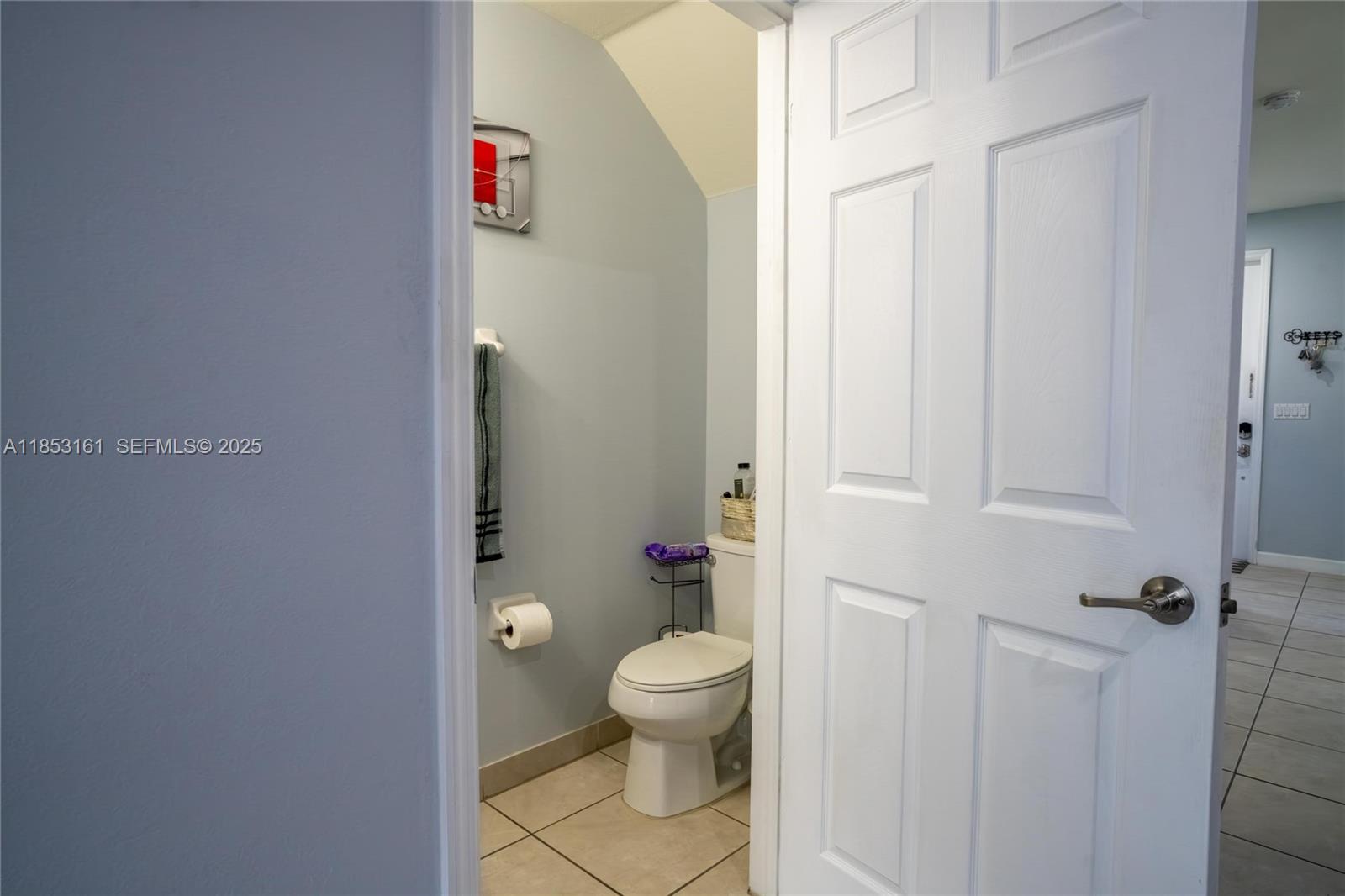 11571 Southwest 248th Lane Homestead, FL 33032 - Photo 18 of 26 a bathroom with a toilet and a shower