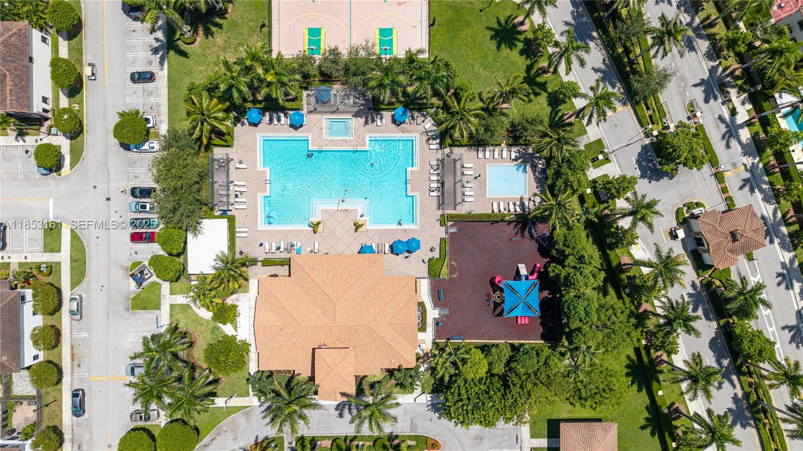 11571 Southwest 248th Lane Homestead, FL 33032 - Photo 5 of 26 an aerial view of a house with a yard and swimming pool