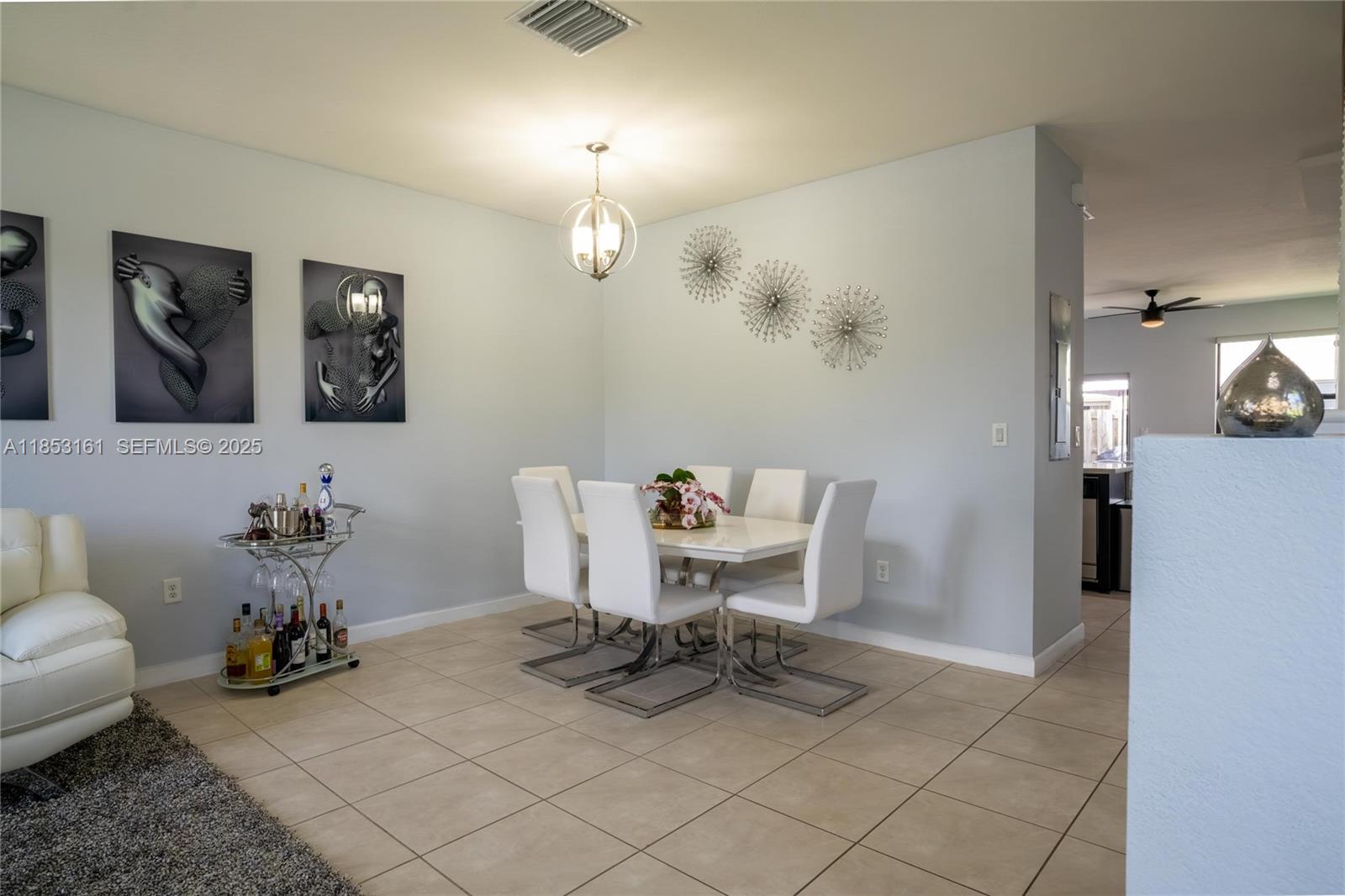11571 Southwest 248th Lane Homestead, FL 33032 - Photo 10 of 26 a view of a livingroom with furniture and a couch