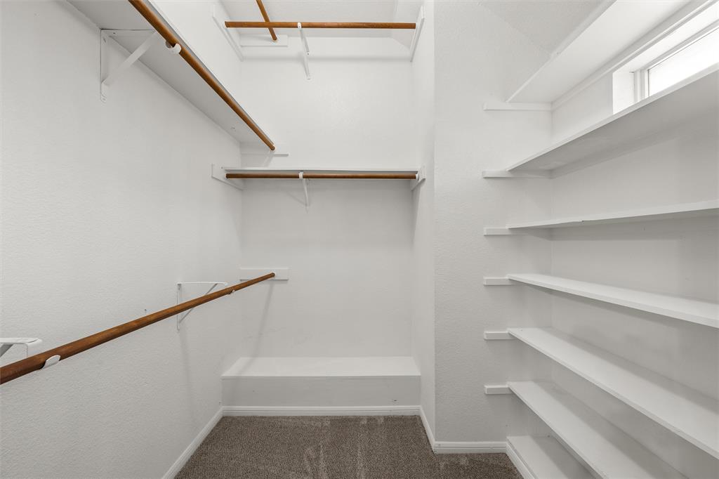 940 Cheyenne Trail Hewitt, TX 76643 - Photo 19 of 40 Walk in closet with dark colored carpet