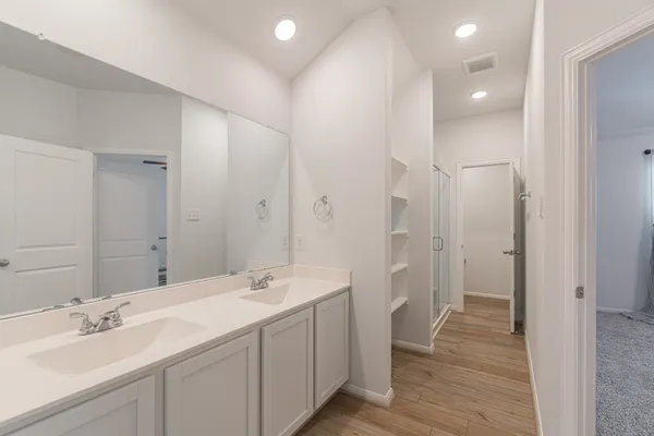 a view of a room with racks on the wall