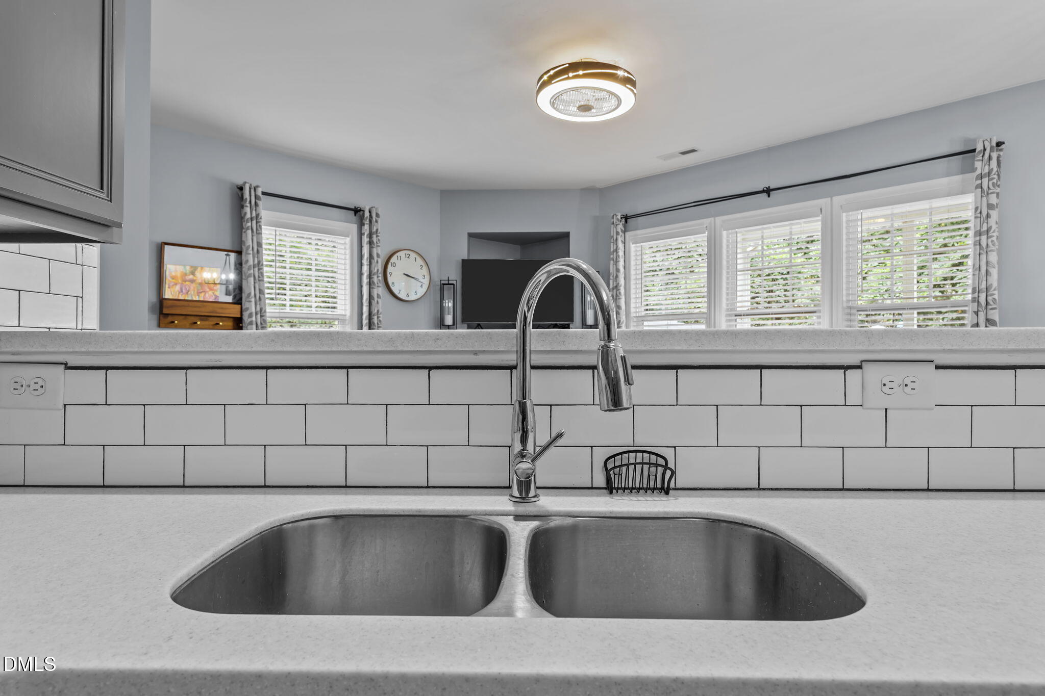 153 Deacon Ridge Street Wake Forest, NC 27587 - Photo 13 of 34 a close view of sink and tap