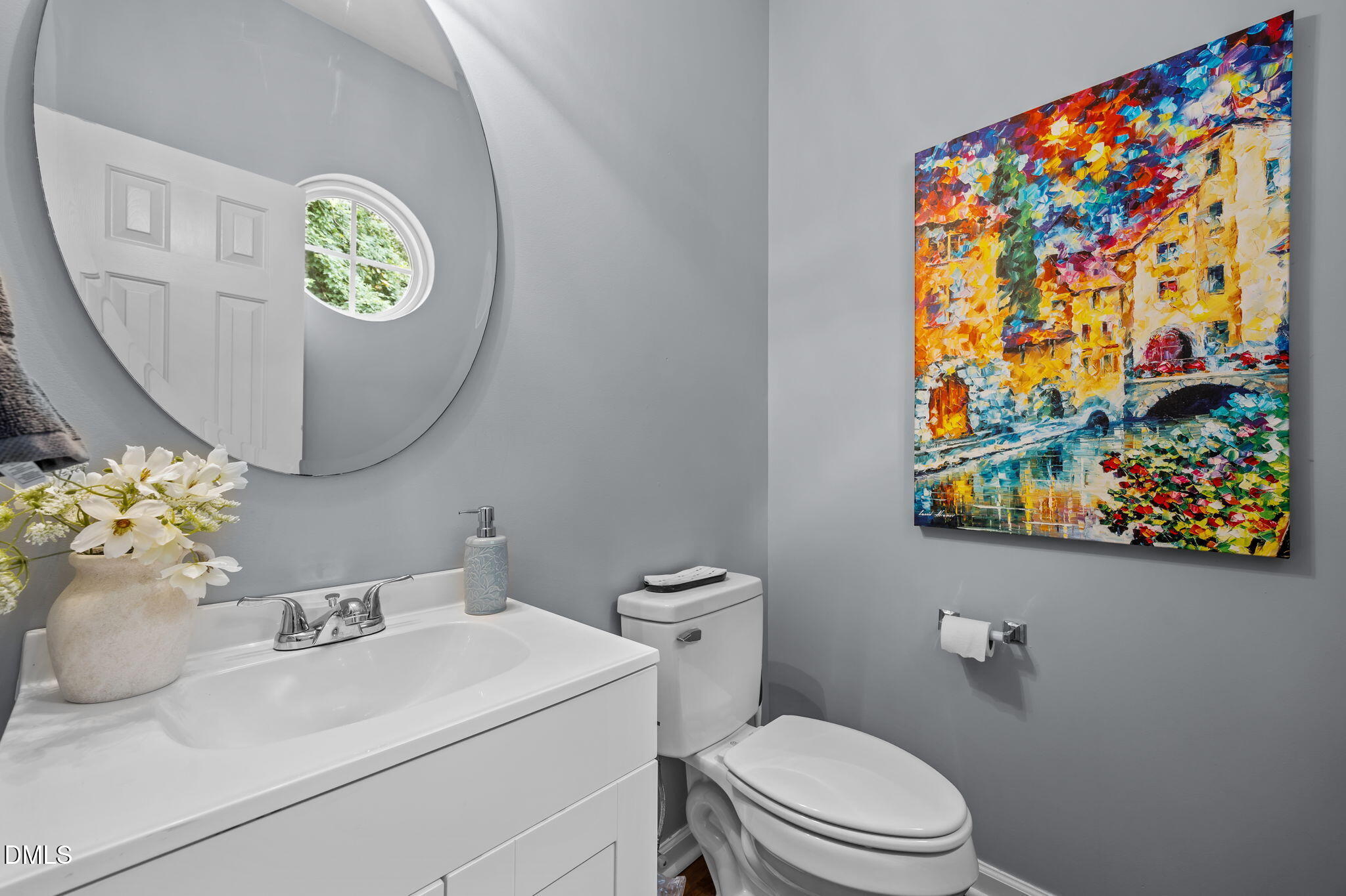 153 Deacon Ridge Street Wake Forest, NC 27587 - Photo 14 of 34 a bathroom with a sink mirror and toilet