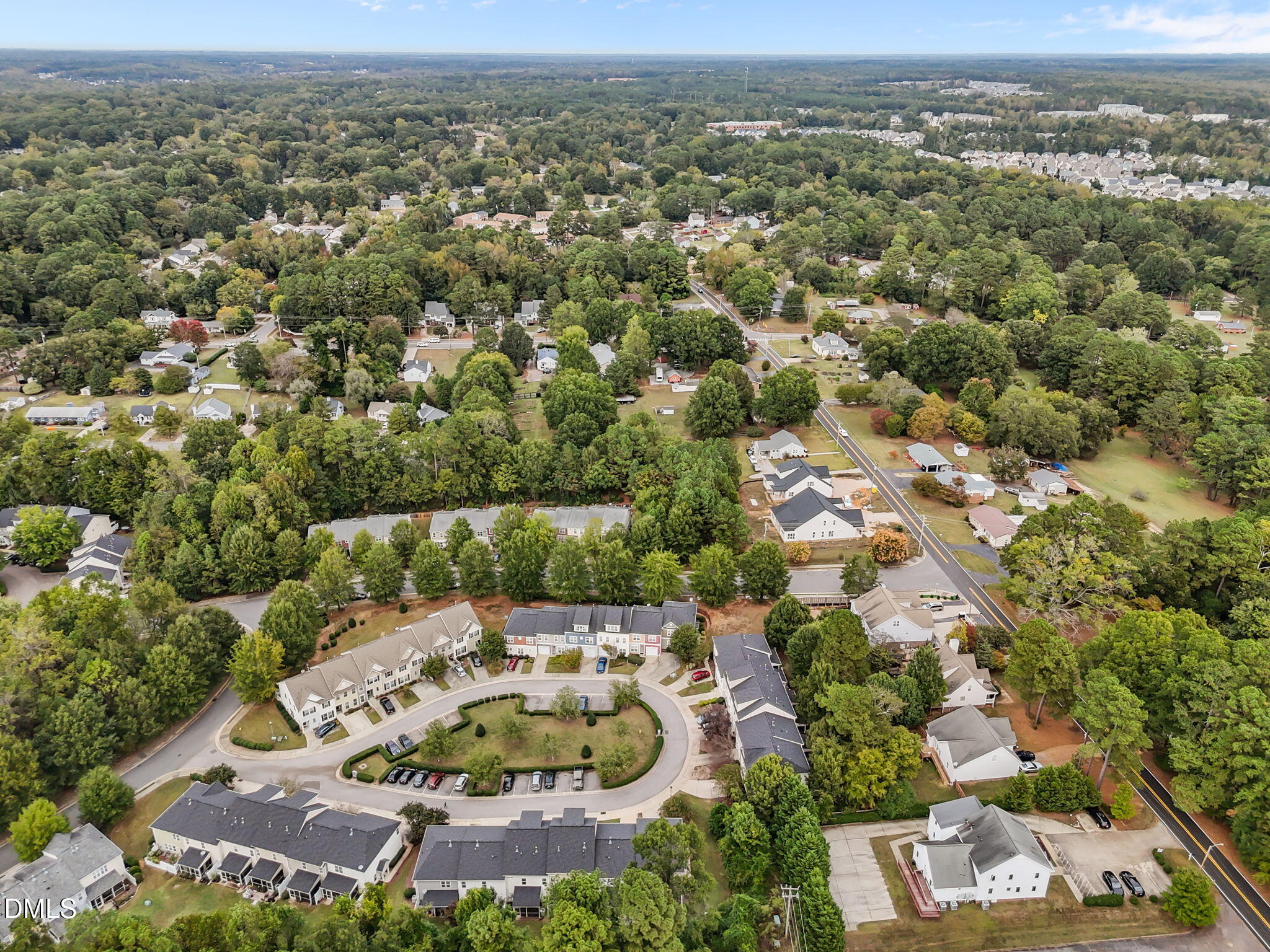 153 Deacon Ridge Street Wake Forest, NC 27587 - Photo 33 of 34 an aerial view of a house with a yard and lake view