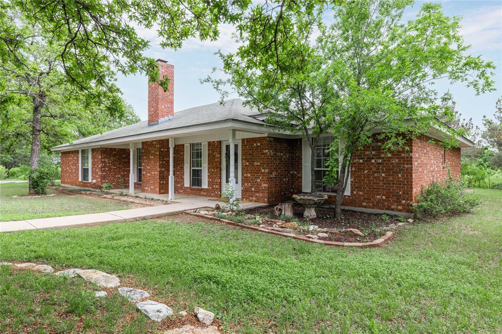 4300 County Road 372 Early, TX 76802 - Photo 2 of 40 a view of a house with backyard and sitting area