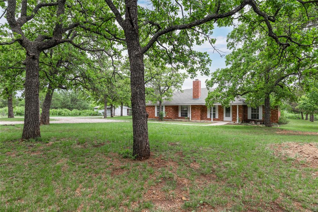 4300 County Road 372 Early, TX 76802 - Photo 28 of 40 a view of a house with a yard
