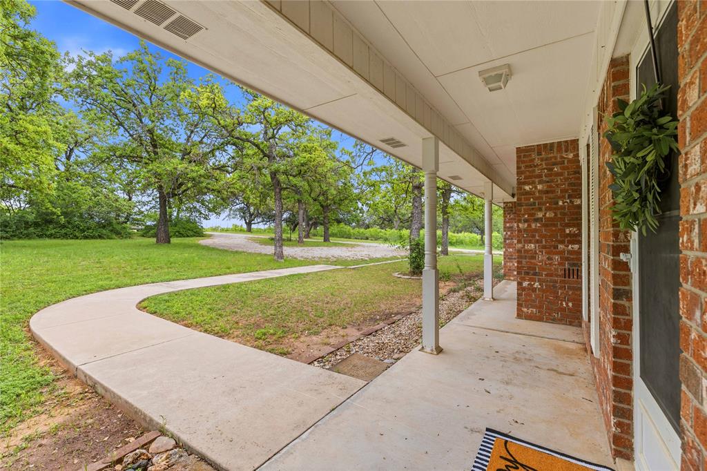 4300 County Road 372 Early, TX 76802 - Photo 6 of 40 a view of a garden with an outdoor space