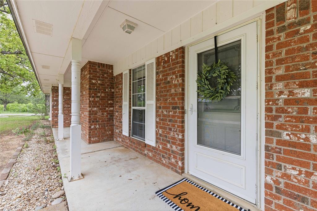 4300 County Road 372 Early, TX 76802 - Photo 7 of 40 a view of front door and deck of the house