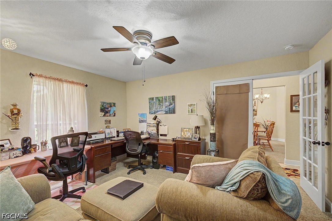 9915 Nichols Lake Road Milton, FL 32583 - Photo 23 of 41 a living room with furniture and a large window
