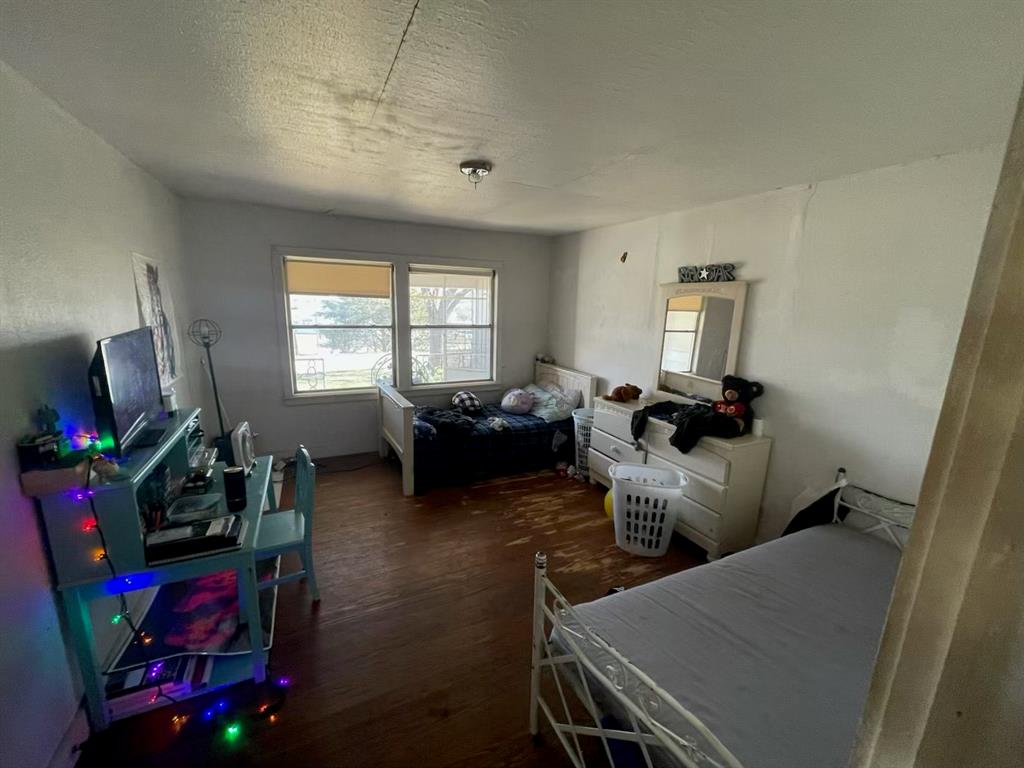 1227 Highway 82 Nocona, TX 76255 - Photo 15 of 19 a view of a livingroom with furniture and a window