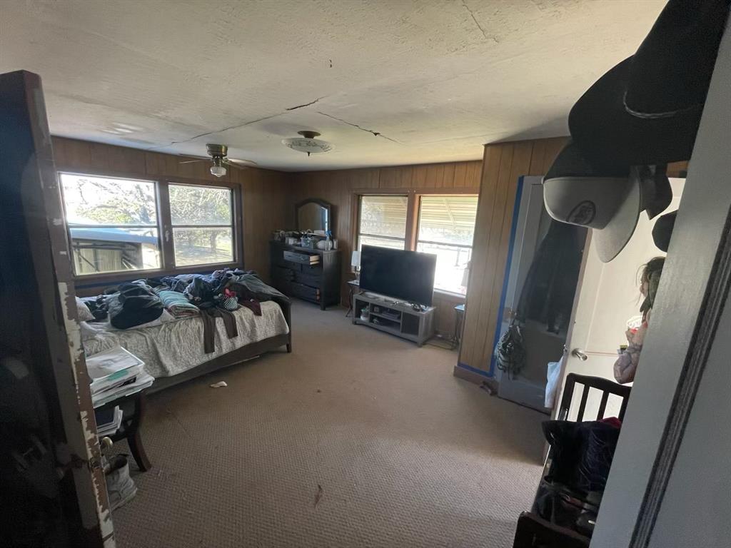 1227 Highway 82 Nocona, TX 76255 - Photo 16 of 19 a bedroom with furniture and a window