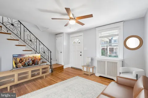 a view of an entryway with wooden floor