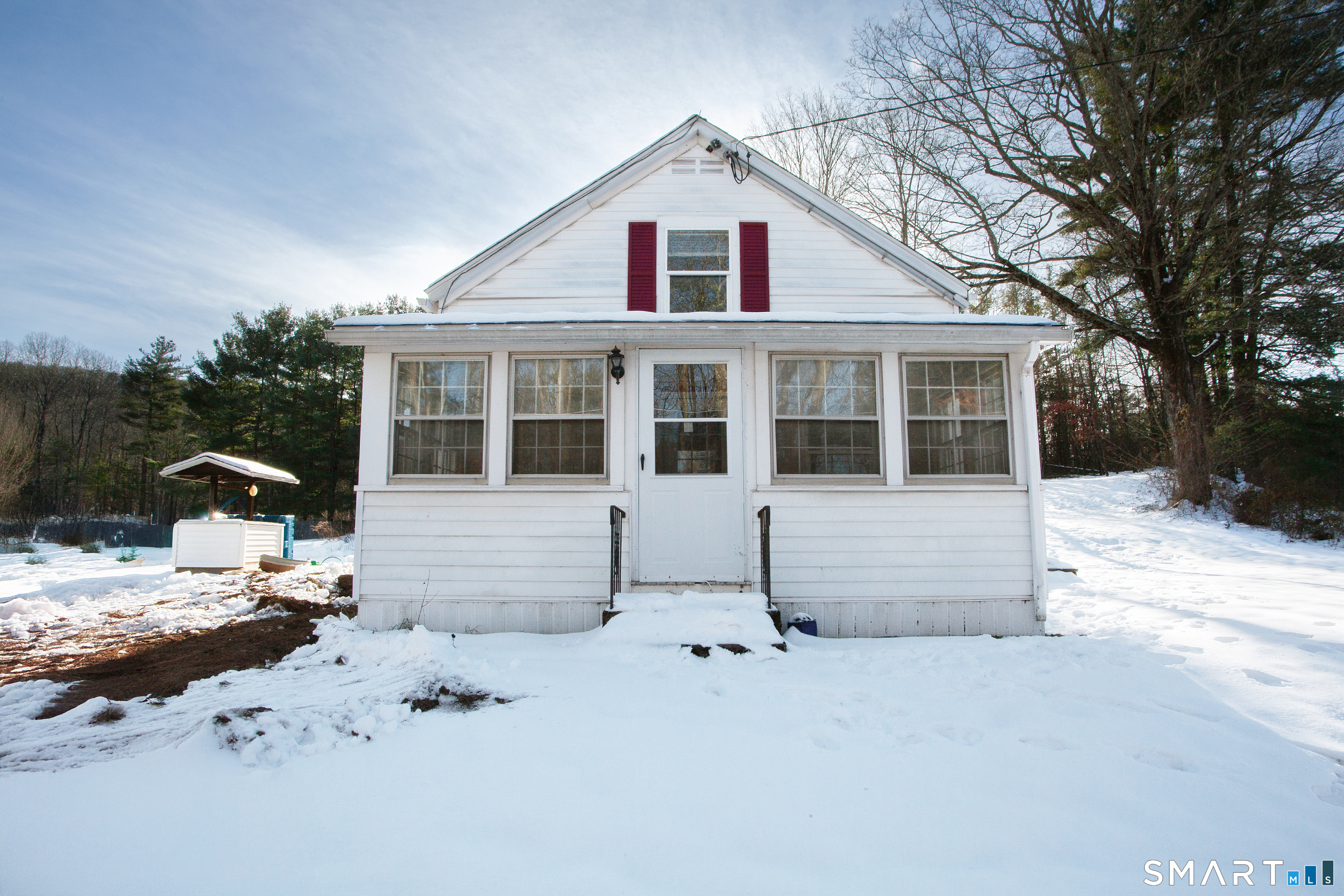 85 Quarry Road Granby, CT 06035 - Photo 1 of 1 a front view of a house with a yard