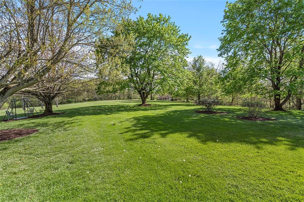 120 Township Line Road Butler, PA 16002 - Photo 2 of 25 a view of grassy field with benches and trees all around