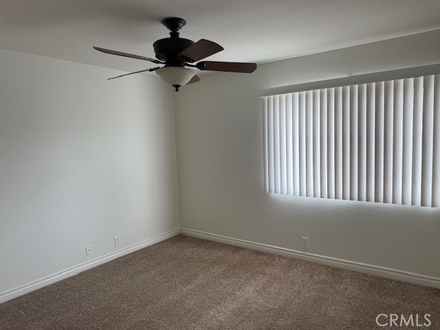 79740 Ave 42, Unit 5 Bermuda Dunes, CA 92203 - Photo 14 of 21 a view of an empty room with a window