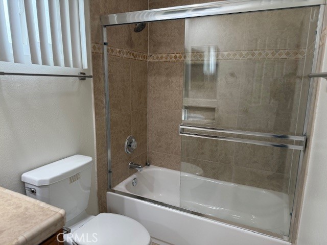 79740 Ave 42, Unit 5 Bermuda Dunes, CA 92203 - Photo 15 of 21 a bathroom with a shower and a toilet