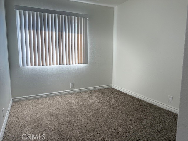 79740 Ave 42, Unit 5 Bermuda Dunes, CA 92203 - Photo 17 of 21 an empty room with a window