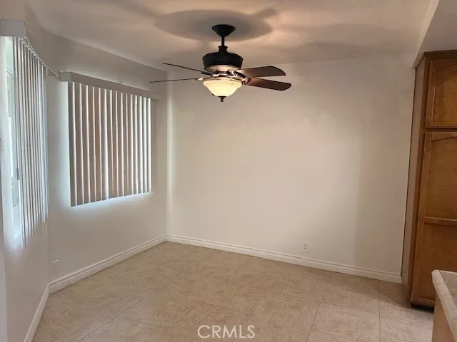 a white refrigerator freezer sitting in a kitchen