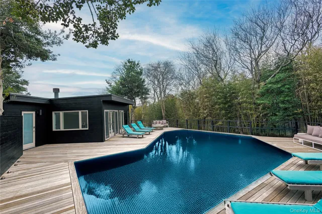 a swimming pool view with a outdoor space