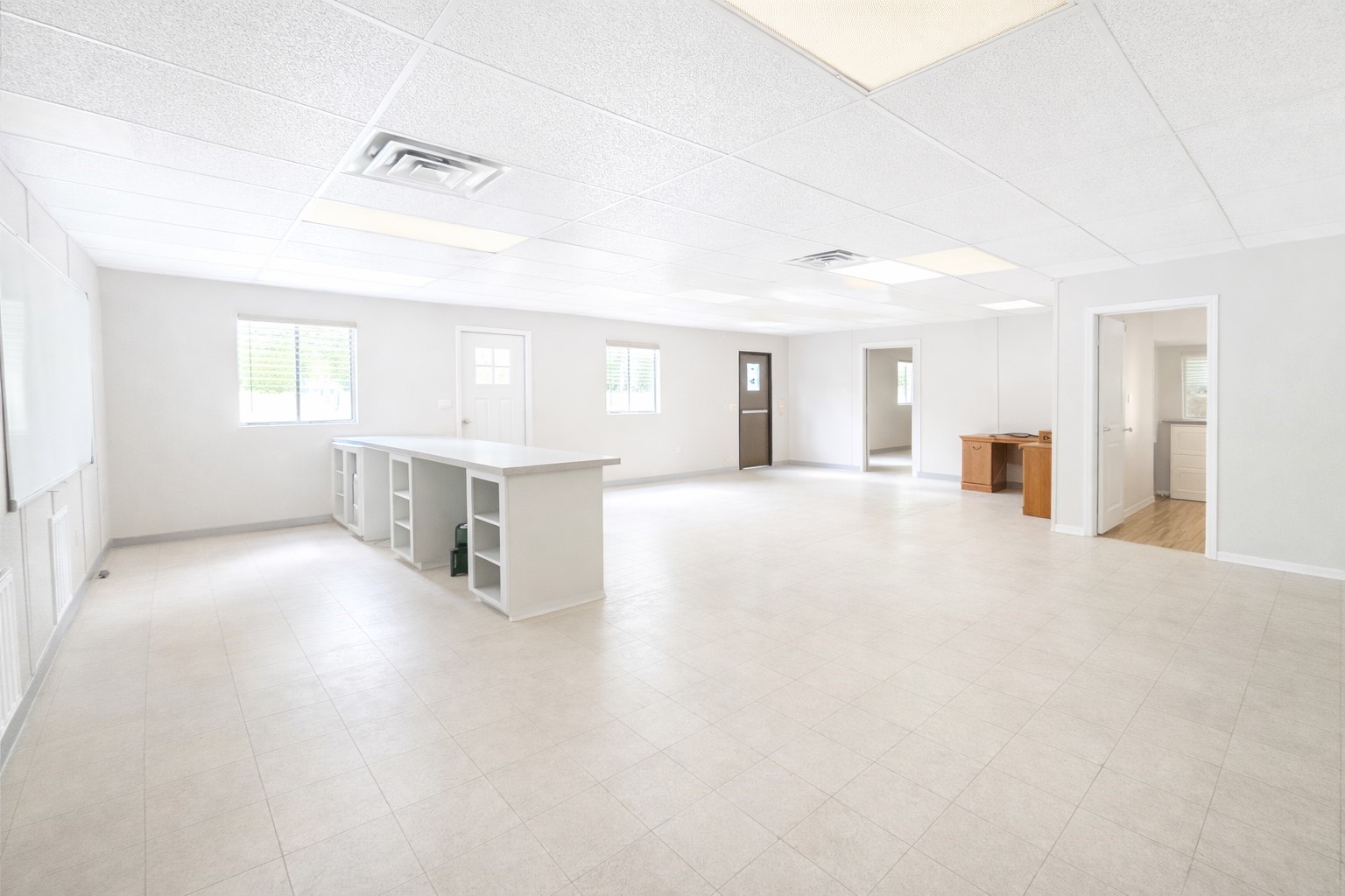 817 Walnut Wharton, TX 77488 - Photo 1 of 10 a view of a kitchen with a sink and a large window