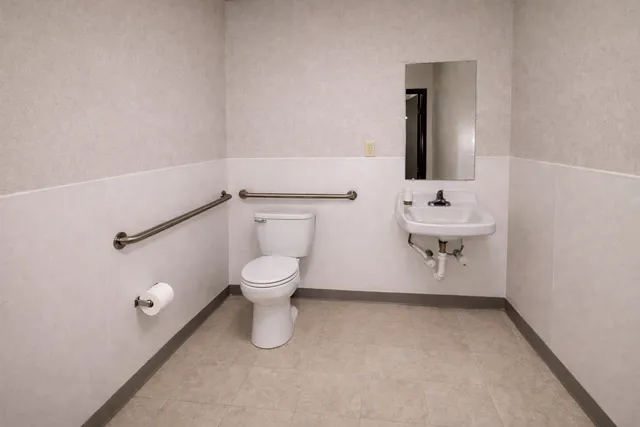 a bedroom with furniture and a couch