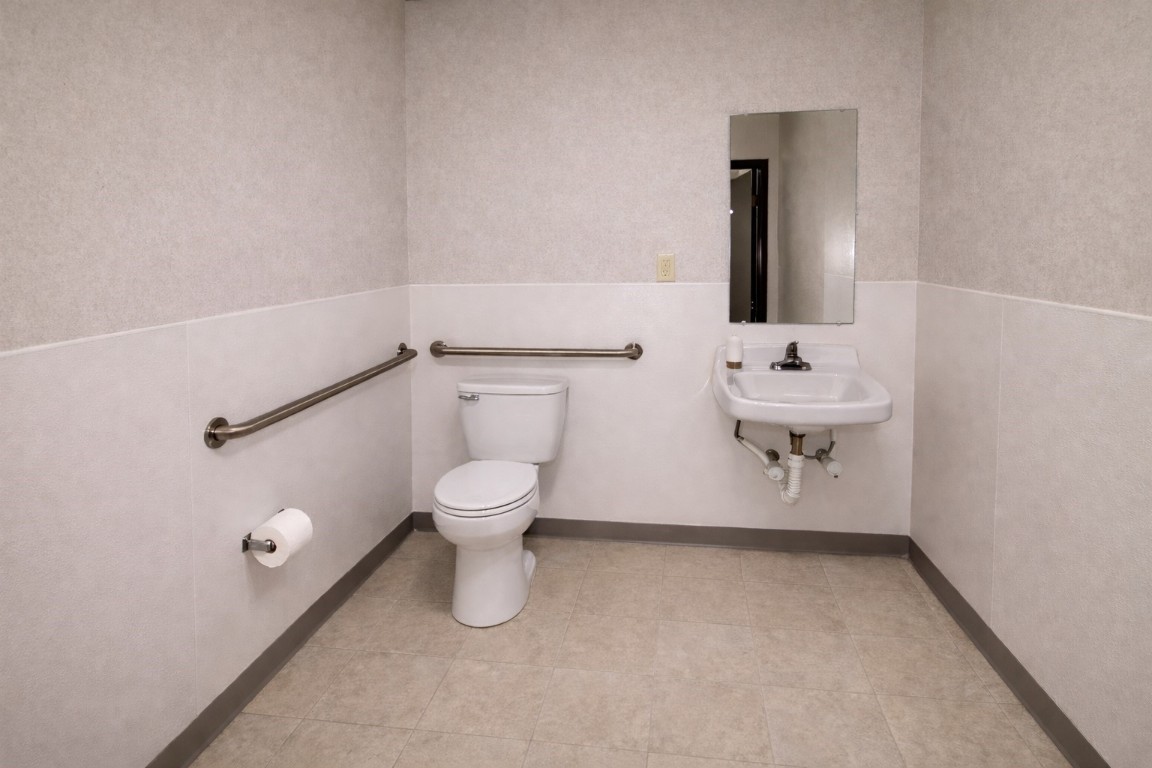 817 Walnut Wharton, TX 77488 - Photo 5 of 10 a bathroom with a toilet