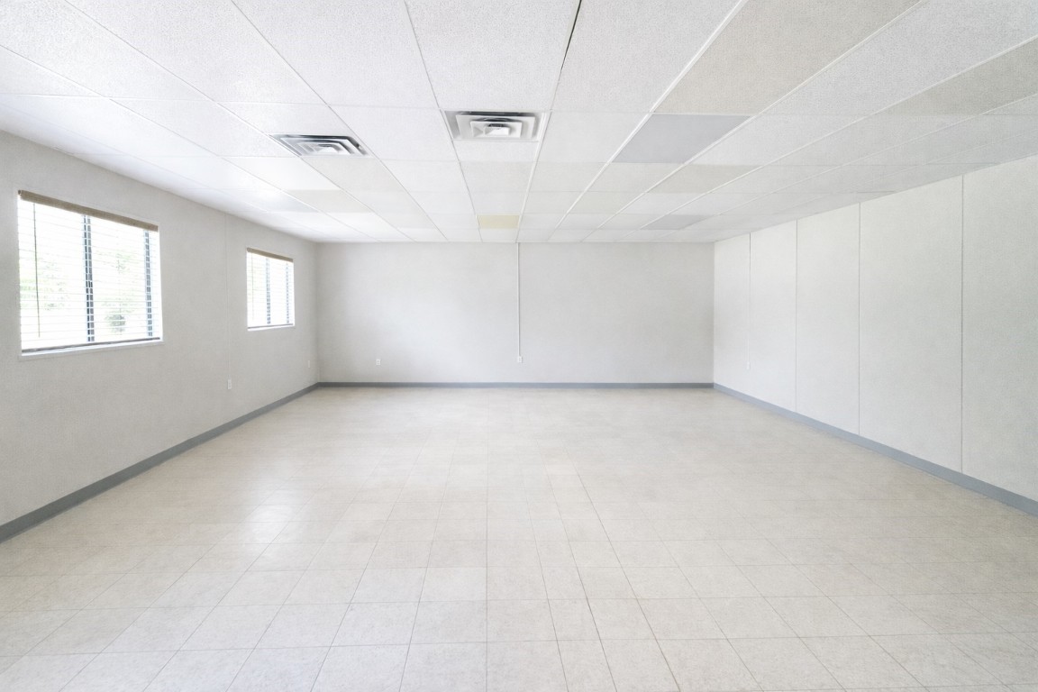 817 Walnut Wharton, TX 77488 - Photo 7 of 10 an empty room with windows