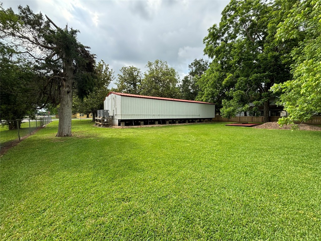 817 Walnut Wharton, TX 77488 - Photo 10 of 10 a view of a park with large trees