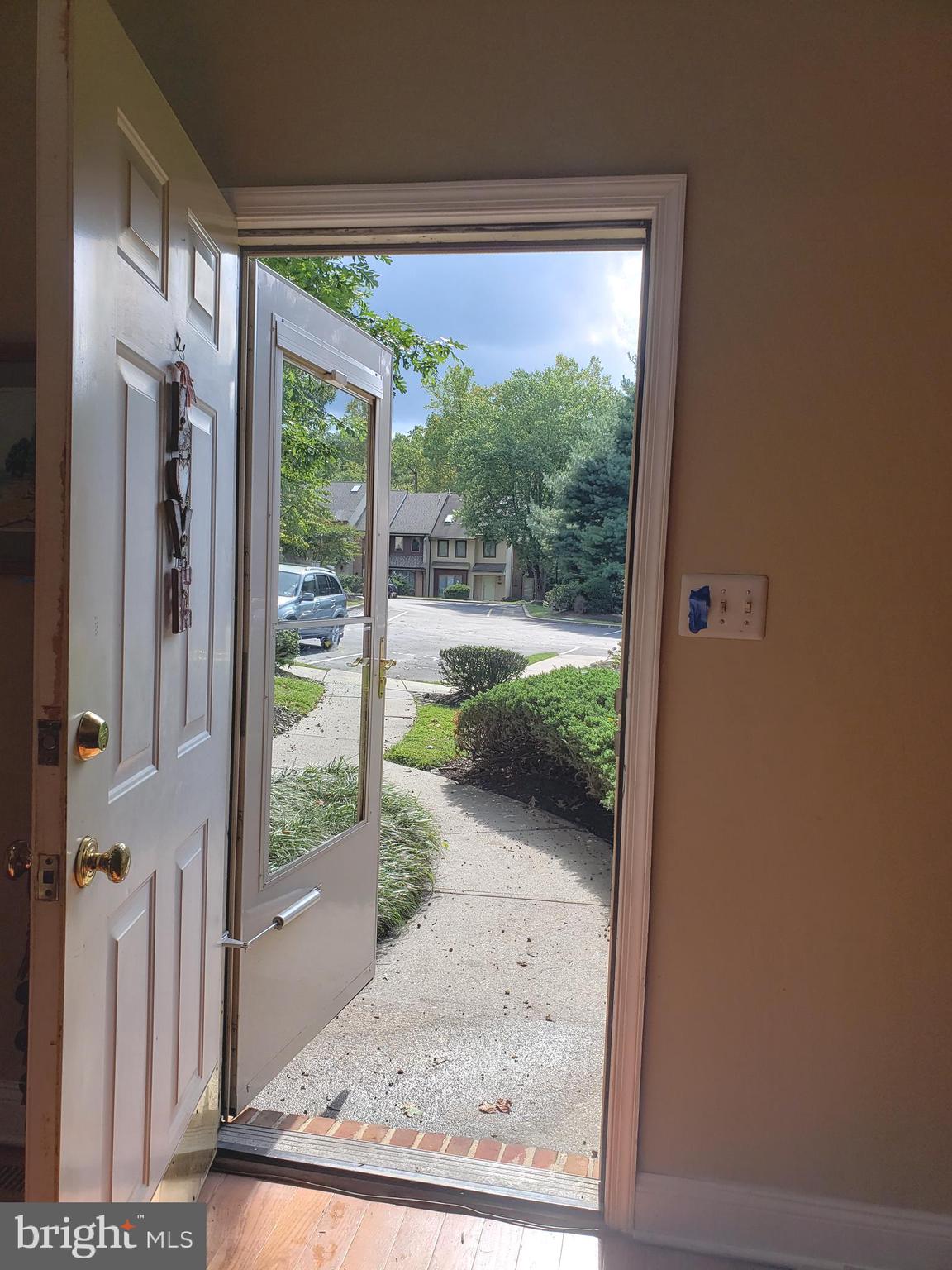 504 Williamson Circle Media, PA 19063 - Photo 2 of 33 a view of a porch with wooden floor and a backyard