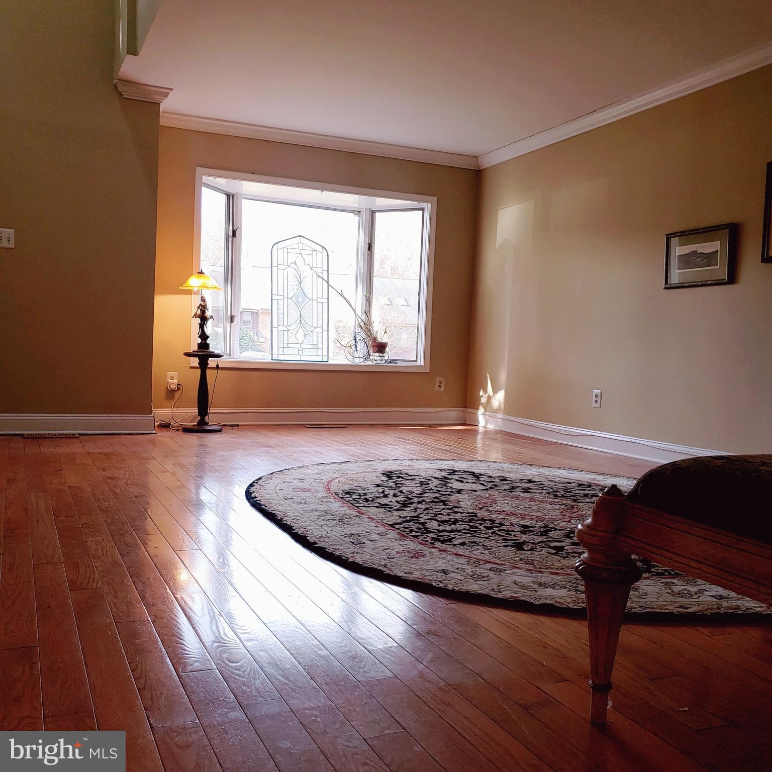 504 Williamson Circle Media, PA 19063 - Photo 3 of 33 a view of a livingroom with wooden floor and a rug