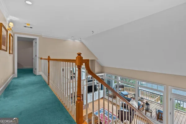 a room with gym equipment and windows