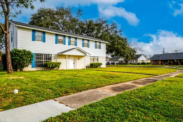 a view of a house with a big yard