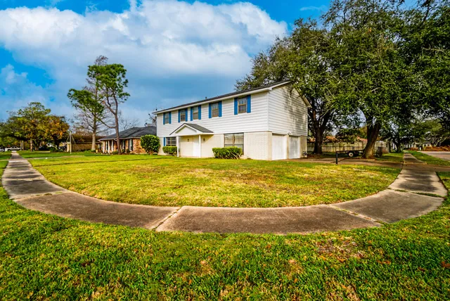 a view of a house with a swimming pool