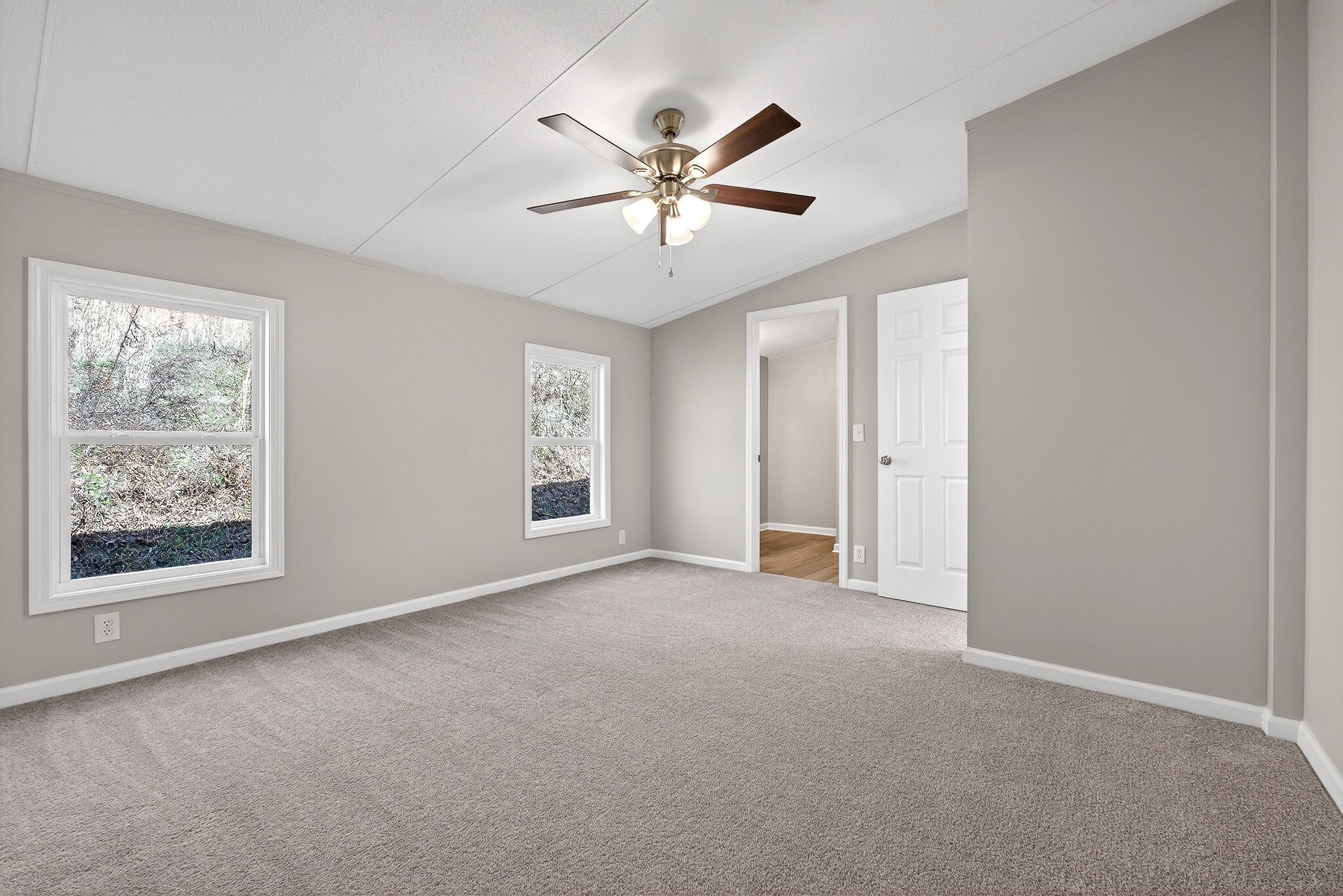 593 Cedar Bend Road Beechgrove, TN 37018 - Photo 17 of 38 wooden floor in an empty room with a window