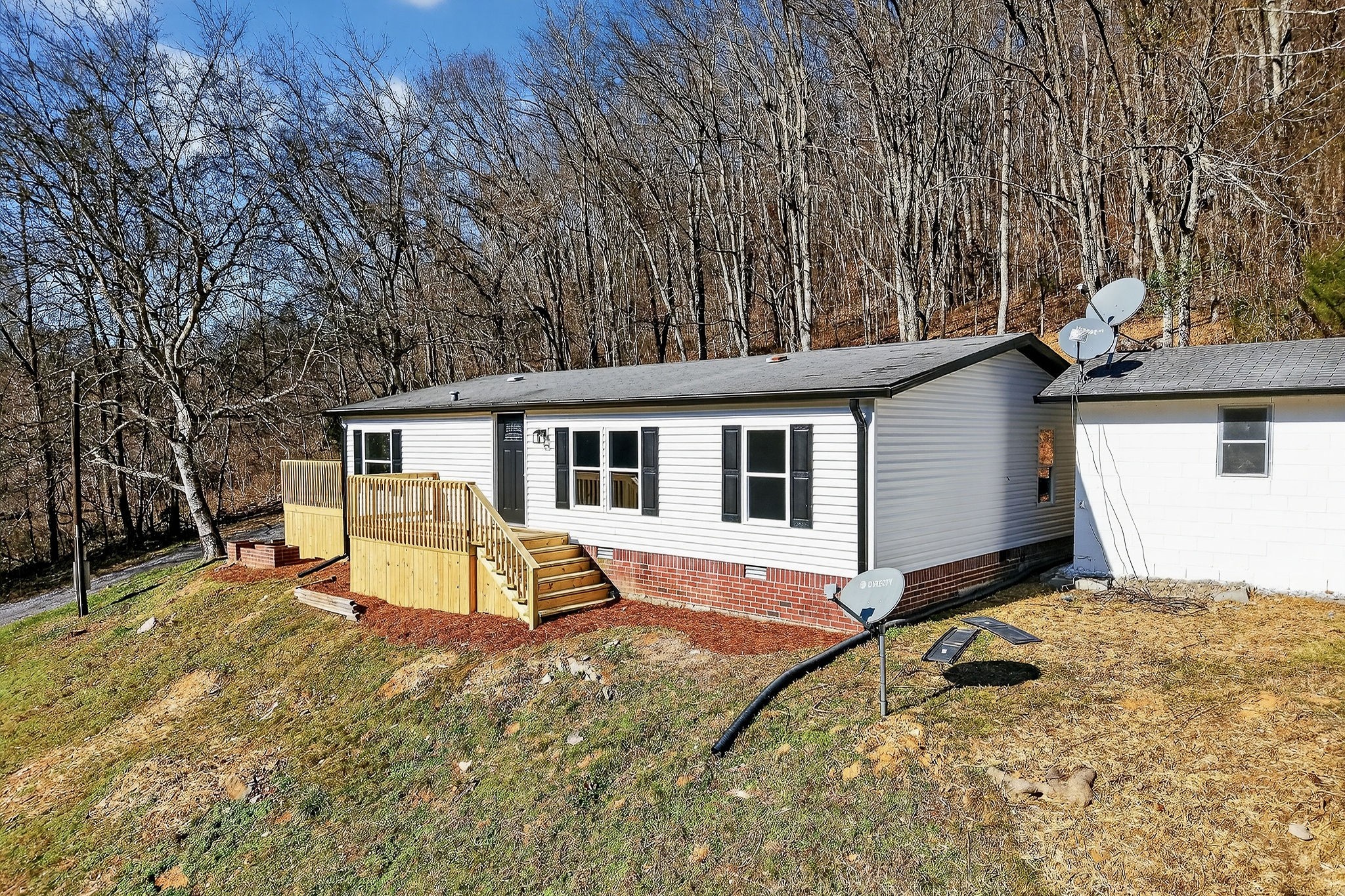 593 Cedar Bend Road Beechgrove, TN 37018 - Photo 33 of 38 a view of a house with backyard and sitting area