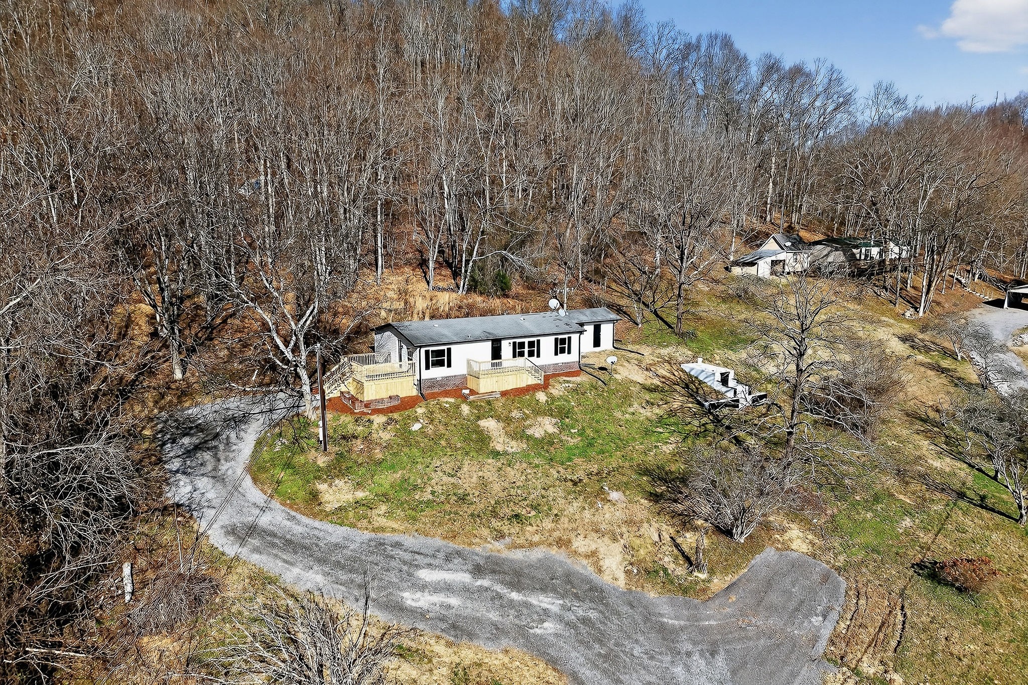 593 Cedar Bend Road Beechgrove, TN 37018 - Photo 34 of 38 a view of a house with a yard