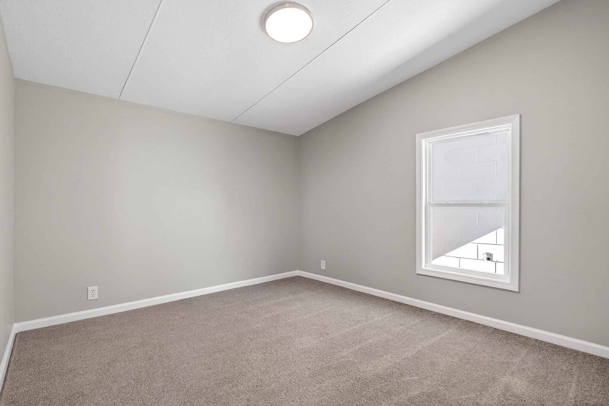 593 Cedar Bend Road Beechgrove, TN 37018 - Photo 5 of 38 an empty room with a window